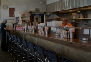 fountain valley ramen counter seating with waitstaff and cook