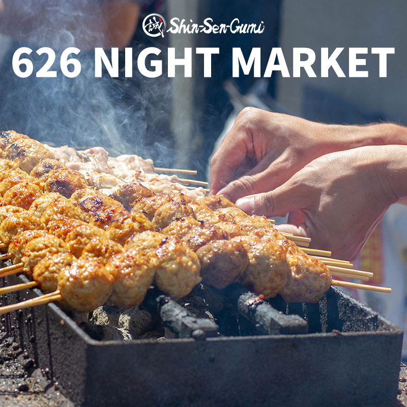 626 night market text above photo of yakitori skewers on the grill with smoke wafting