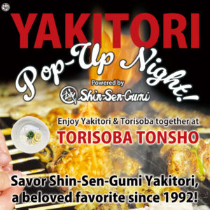 Freshly grilled yakitori skewers over charcoal, sizzling with smoke and glaze, served hot at a Shin-Sen-Gumi pop-up event.