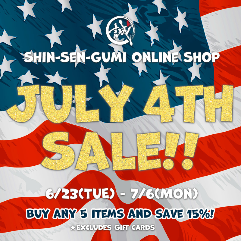 Promotional graphic for the Shin-Sen-Gumi Online Shop July 4th Sale. An American flag fills the background with large gold glitter text reading "JULY 4TH SALE!!" The sale runs from June 23 through July 6. Customers receive 15% off when purchasing five any items. Gift cards are excluded from the promotion.